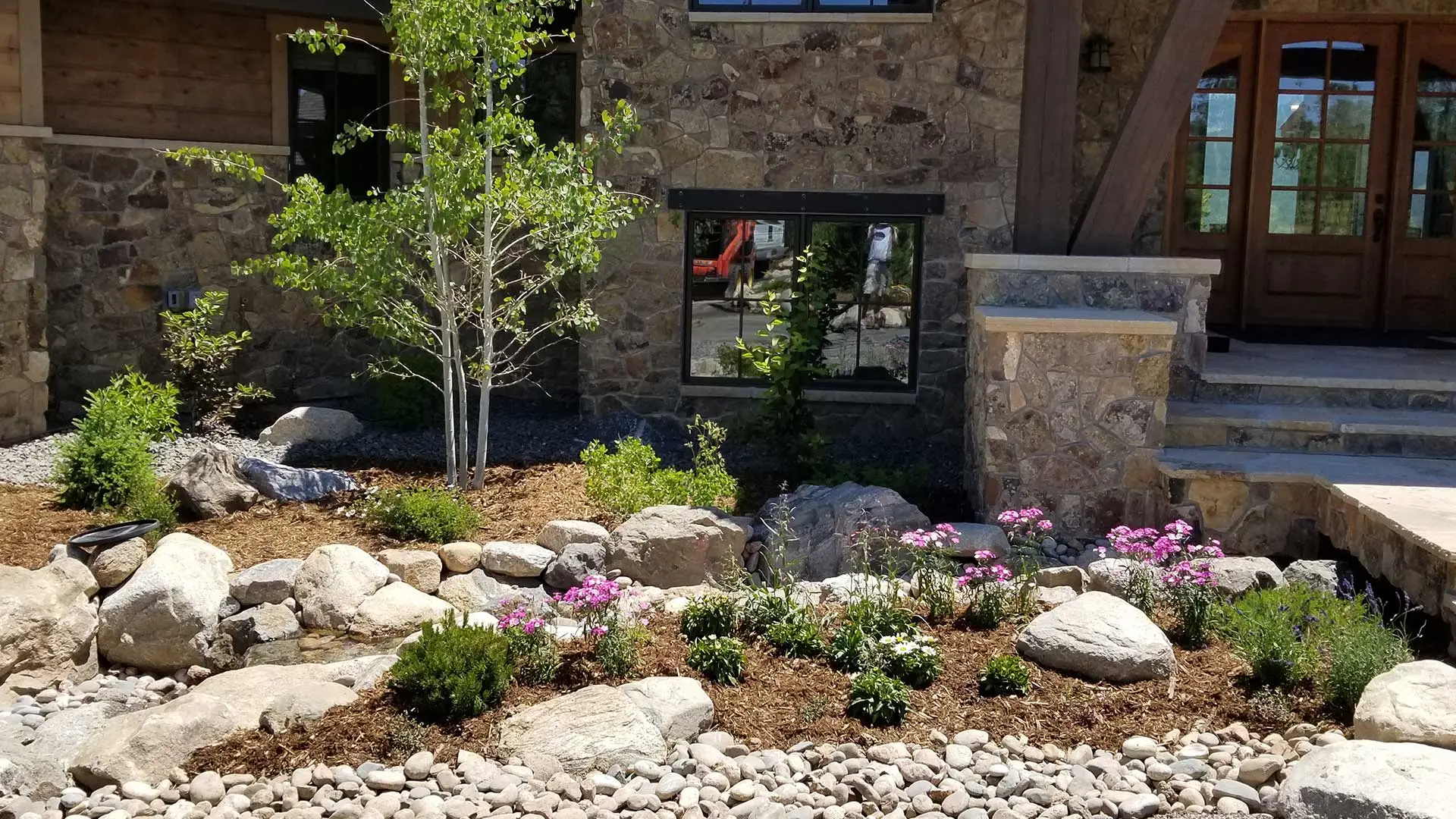 Landscaping in the front of a satisfied customer's home.