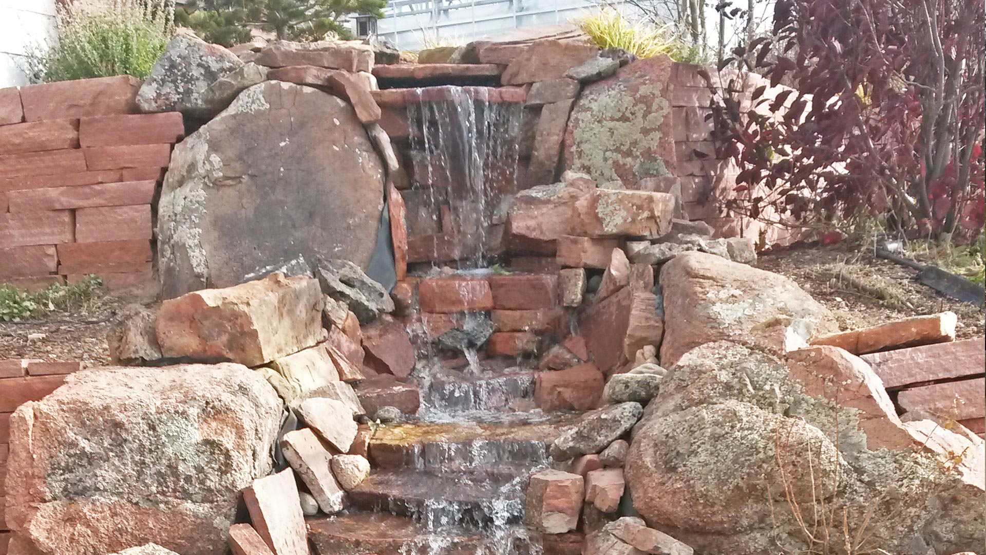 Rock waterfall designed and built by our team.