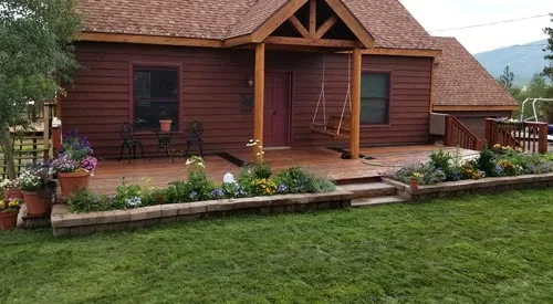 Landscaping in front of a cottage in Fraser, CO.